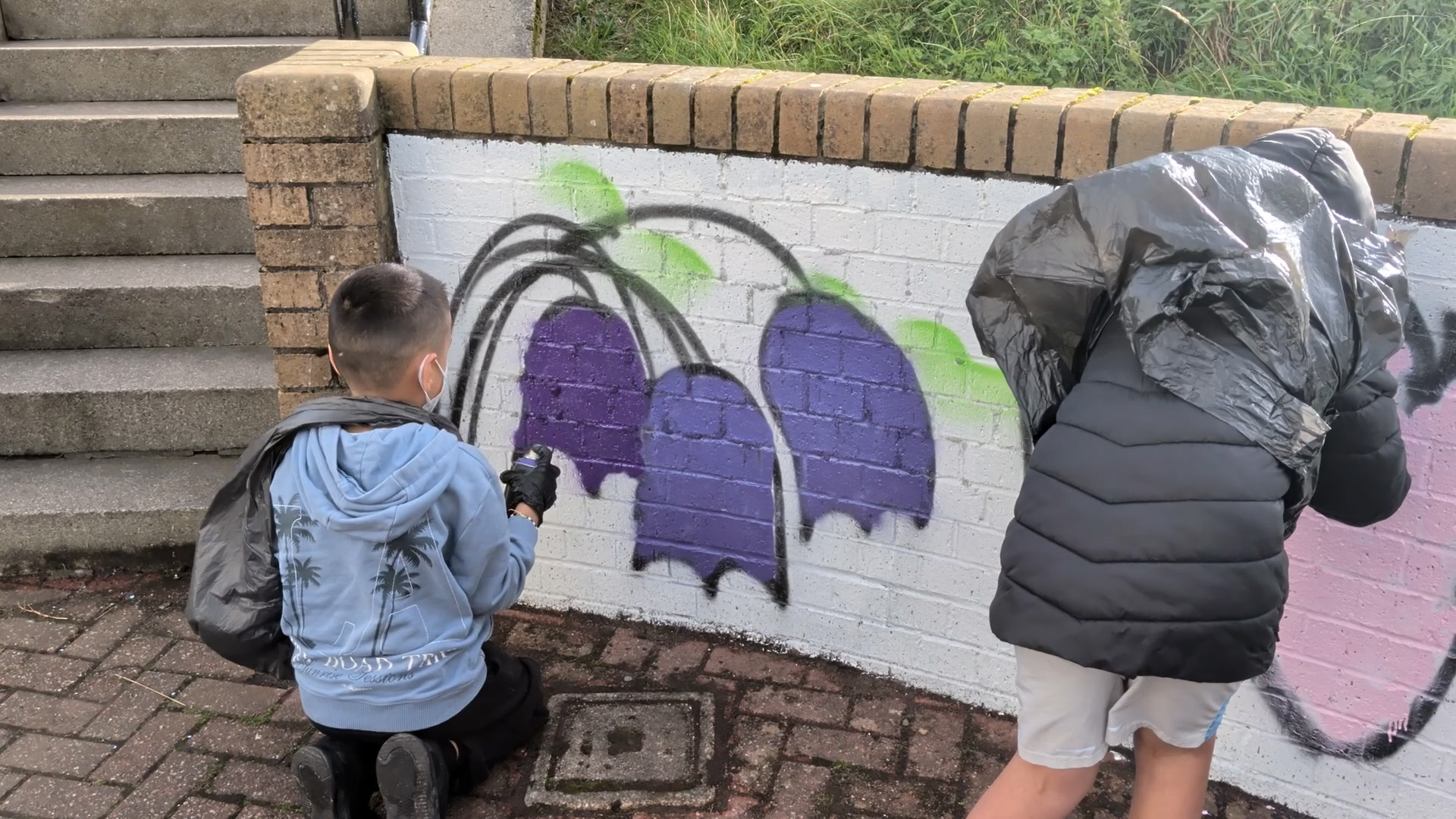 Young artists spruce up Wheatley neighbourhood with colourful murals