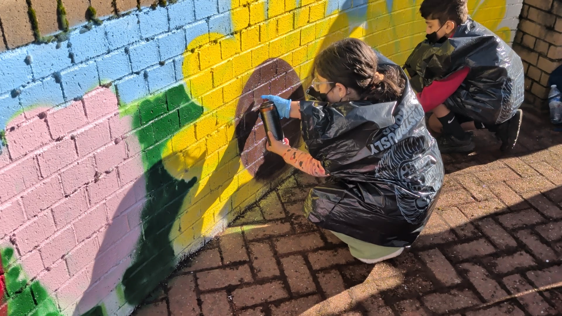 Young artists spruce up Wheatley neighbourhood with colourful murals