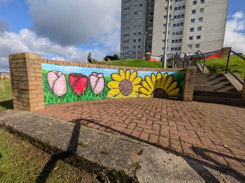 Young artists spruce up Wheatley neighbourhood with colourful murals