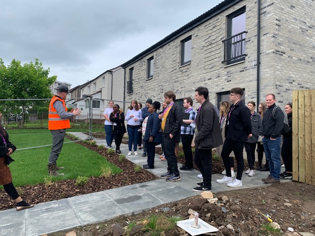 Caledonia shows UK housing professionals around Bellsmyre development