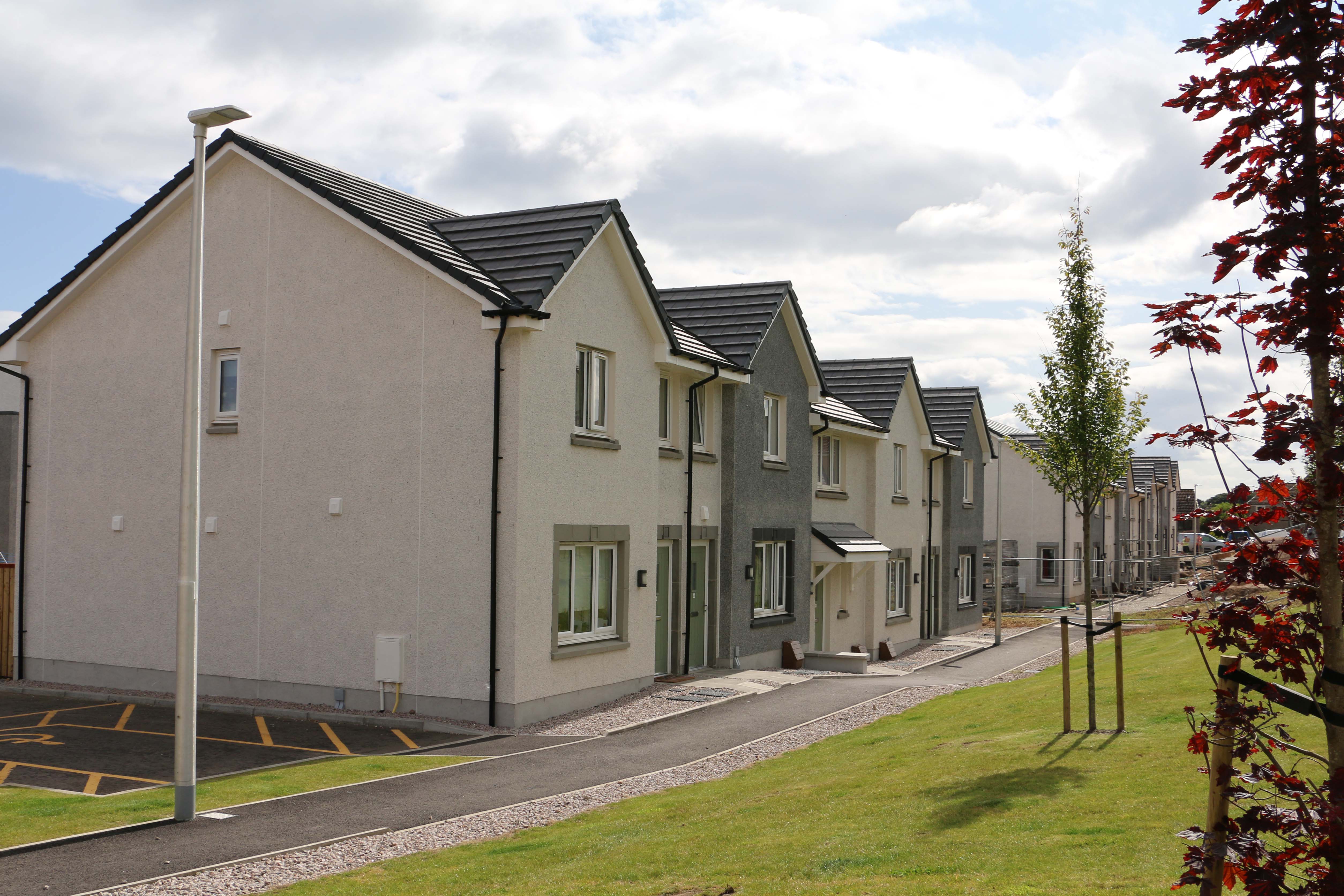 Housing minister formally opens newly completed Hillcrest development in Cove