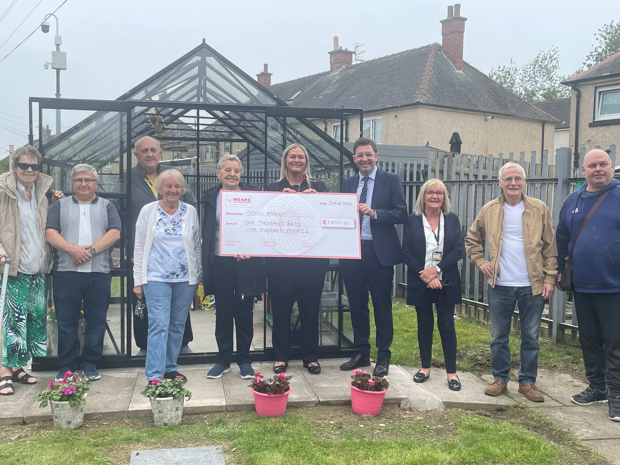 Community spirit blossoms at Wishaw retirement housing with new greenhouse