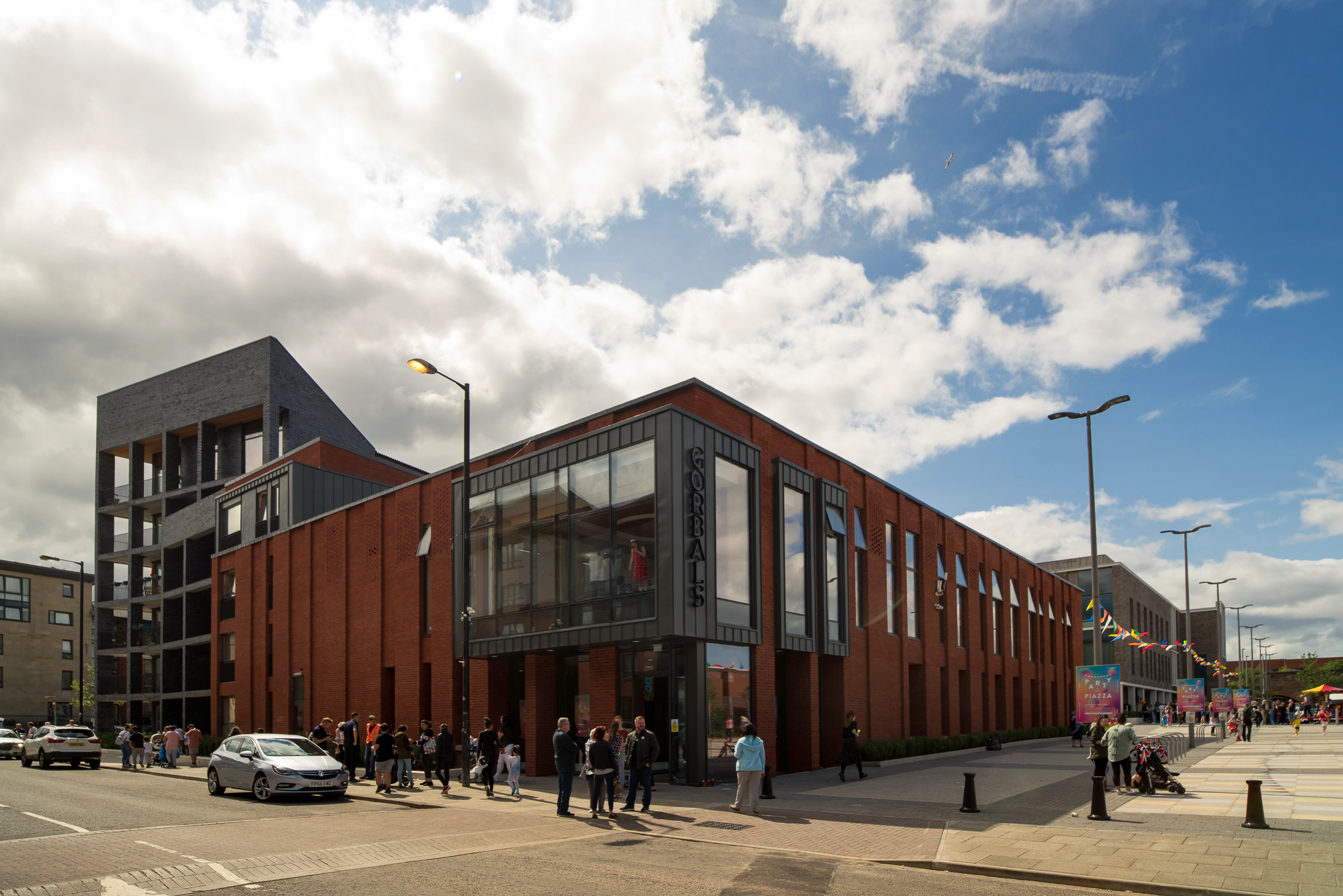 First Minister opens new homes, office and piazza for New Gorbals