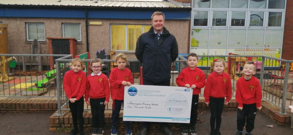 Cunninghame Housing Association makes £1,000 donation to Annan charity and primary school