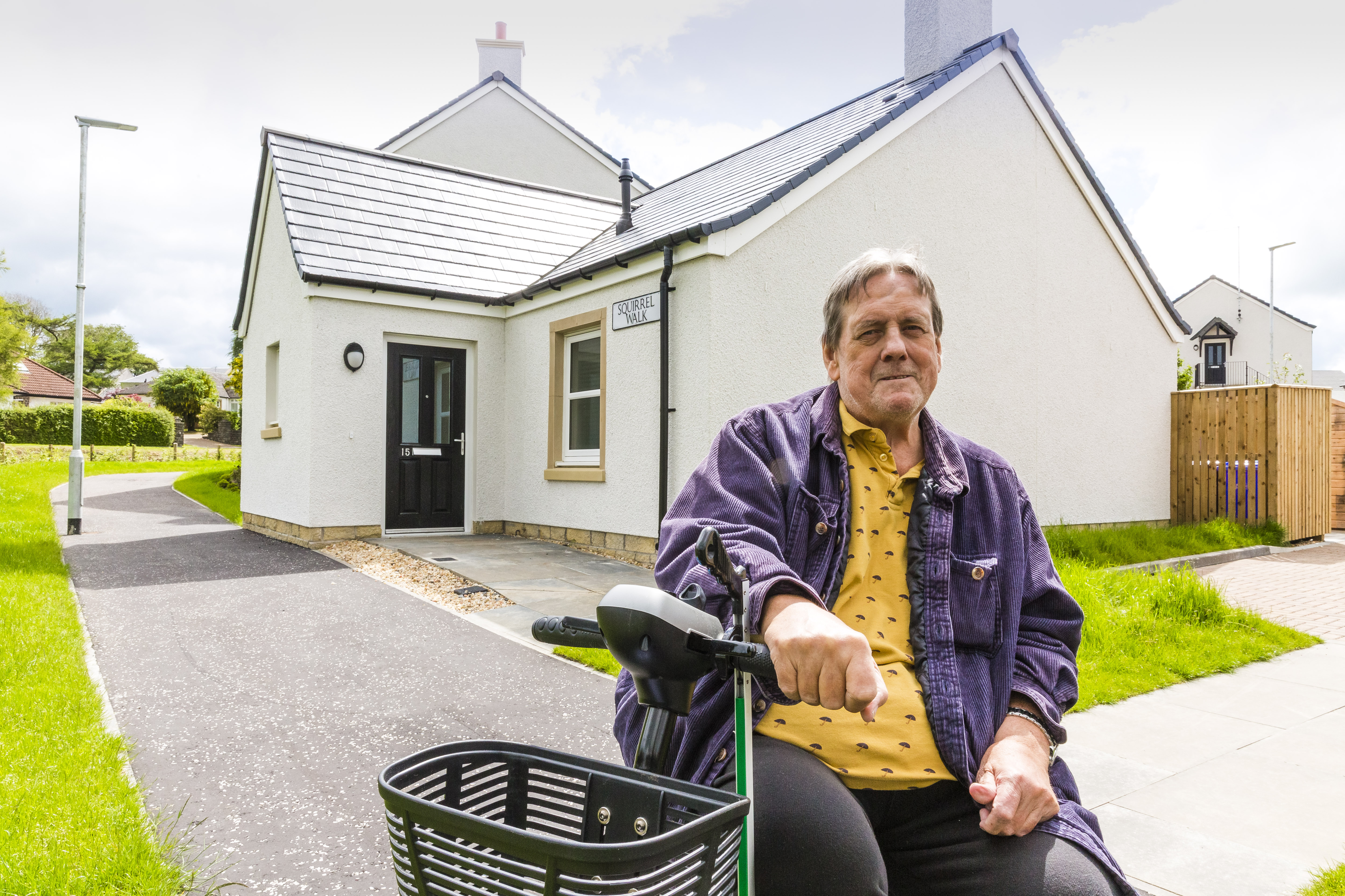 Smiles all around at Symington’s first affordable housing development