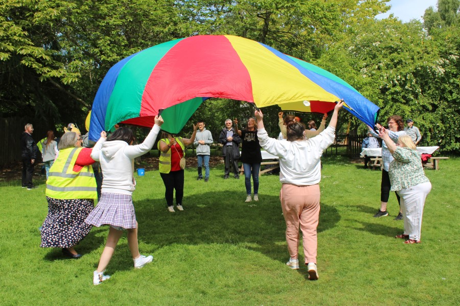 People supported by Hillcrest Futures gather for a Picnic in the Park