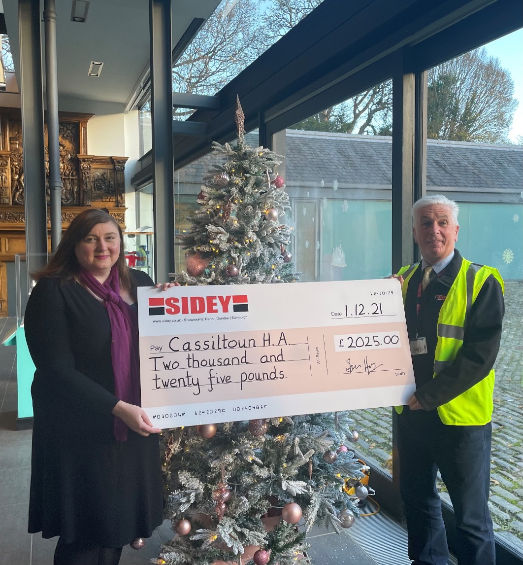 Sidey Solutions donates £2,025 to Cassiltoun Housing Association